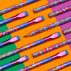 Volume 143 Blackwing pencils on colorful background.