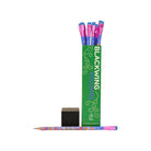 Open box of Blackwing Frida Kahlo pencils next to cap and pencil.