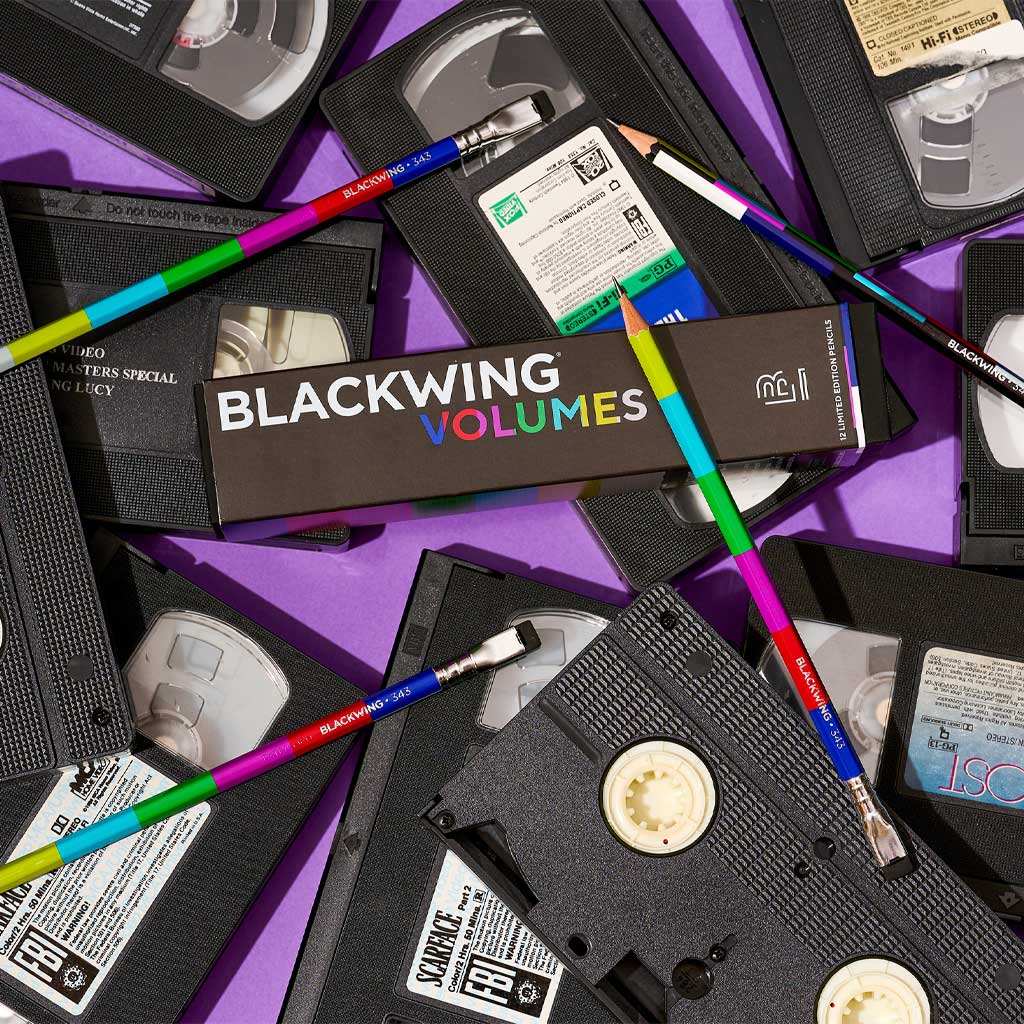 Blackwing Volumes pencils on top of VHS tapes with a purple background