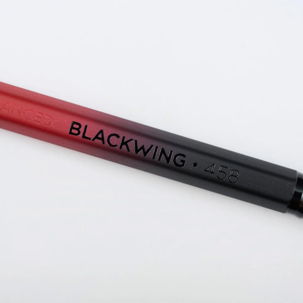 Close up of Blackwing 458 pencil with gradient design on light background