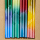 Close up of Blackwing 458 pencils with gradient designs on light background