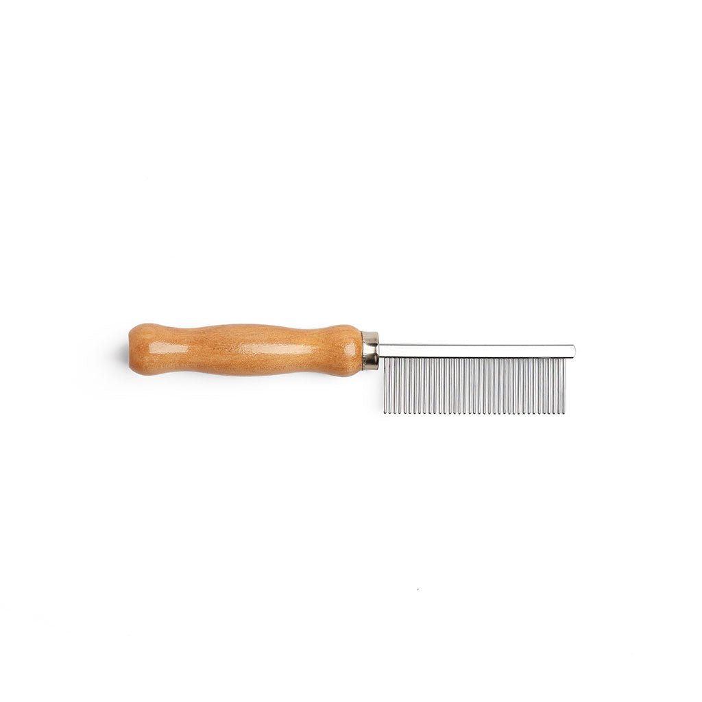 Metal comb with wooden handle for cleaning brushes and brooms on white background