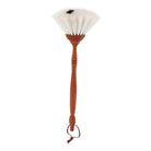 A goat hair dust brush with a pear wood handle and leather loop and white bristles on white background