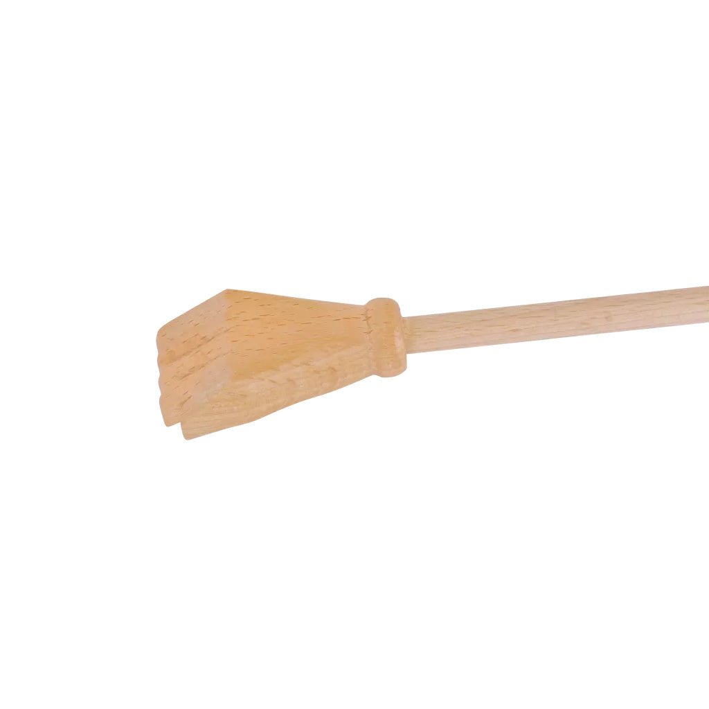 Carved wooden hand on end of backscratcher on white background