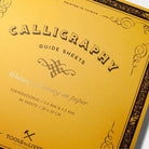 A yellow square calligraphy guide sheet book on white background