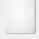 Lined sheet of paper on gray background