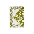 Cambridge Imprint Notecard on top of decorative envelope with a green and white botanical border pattern.