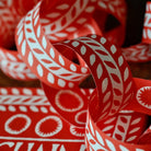 Close-up of assembled red and white paperchain.