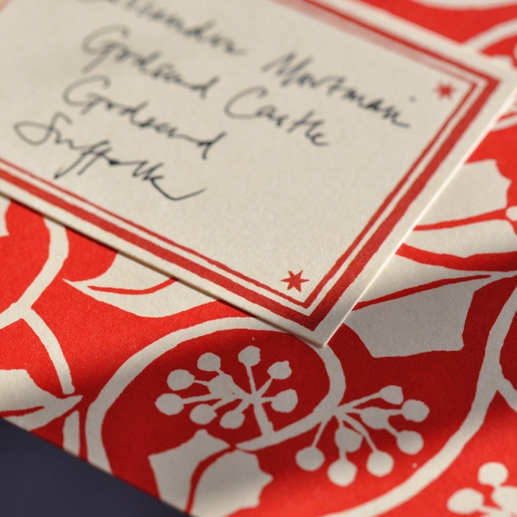 Close-up of label with red accents.