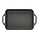 Black rectangular cast iron baking dish with handles on a white background