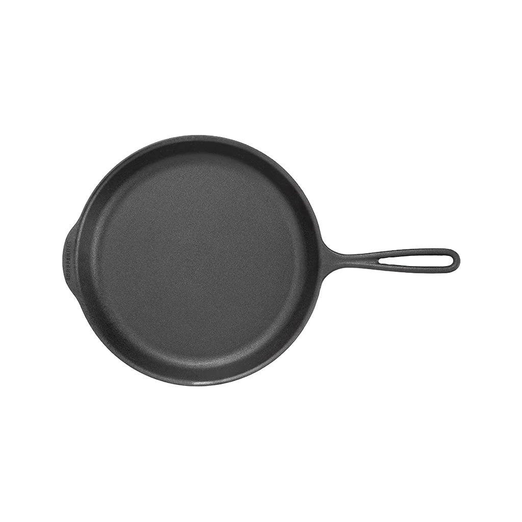 Birds eye view of 11 inch Cast Iron cooking skillet on white background