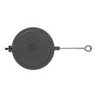 Black cast iron waffle iron closed with aluminum handle on white background