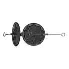 Black cast iron waffle iron open with flower griddle shape and aluminum handle on white background