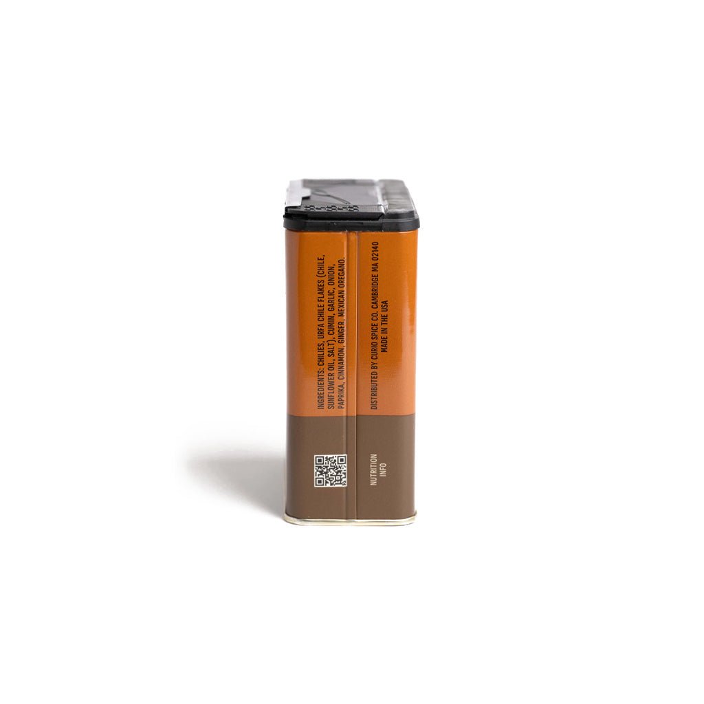 Orange tin of Chili Today! seasoning blend by Curio Spice Company on white background