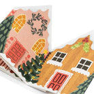 Illustrated greeting card with houses, trees, and a wreath on a white background