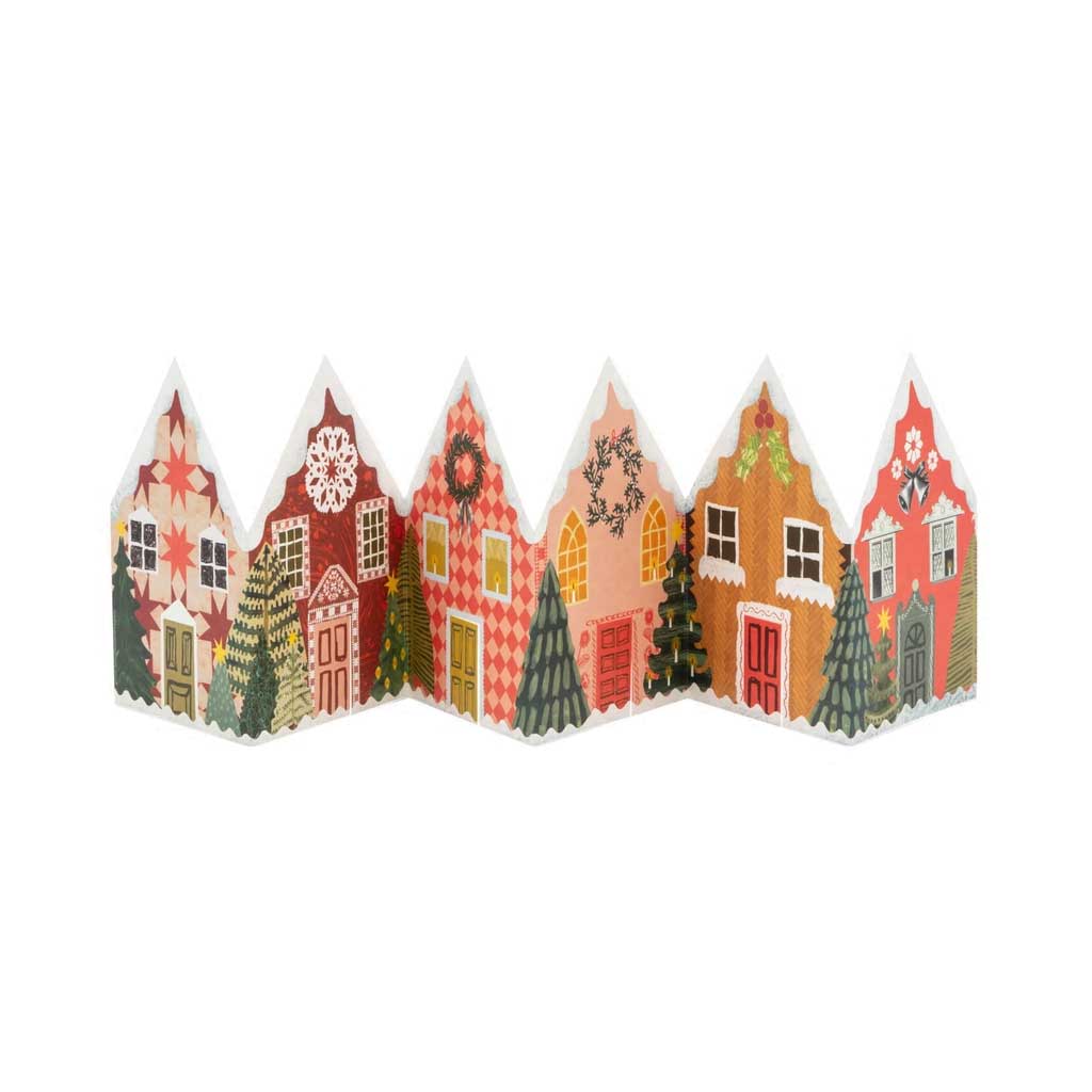 Decorative paper houses with Christmas trees on a white background