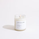 Candle labeled 'Christmas Tree' on a white background