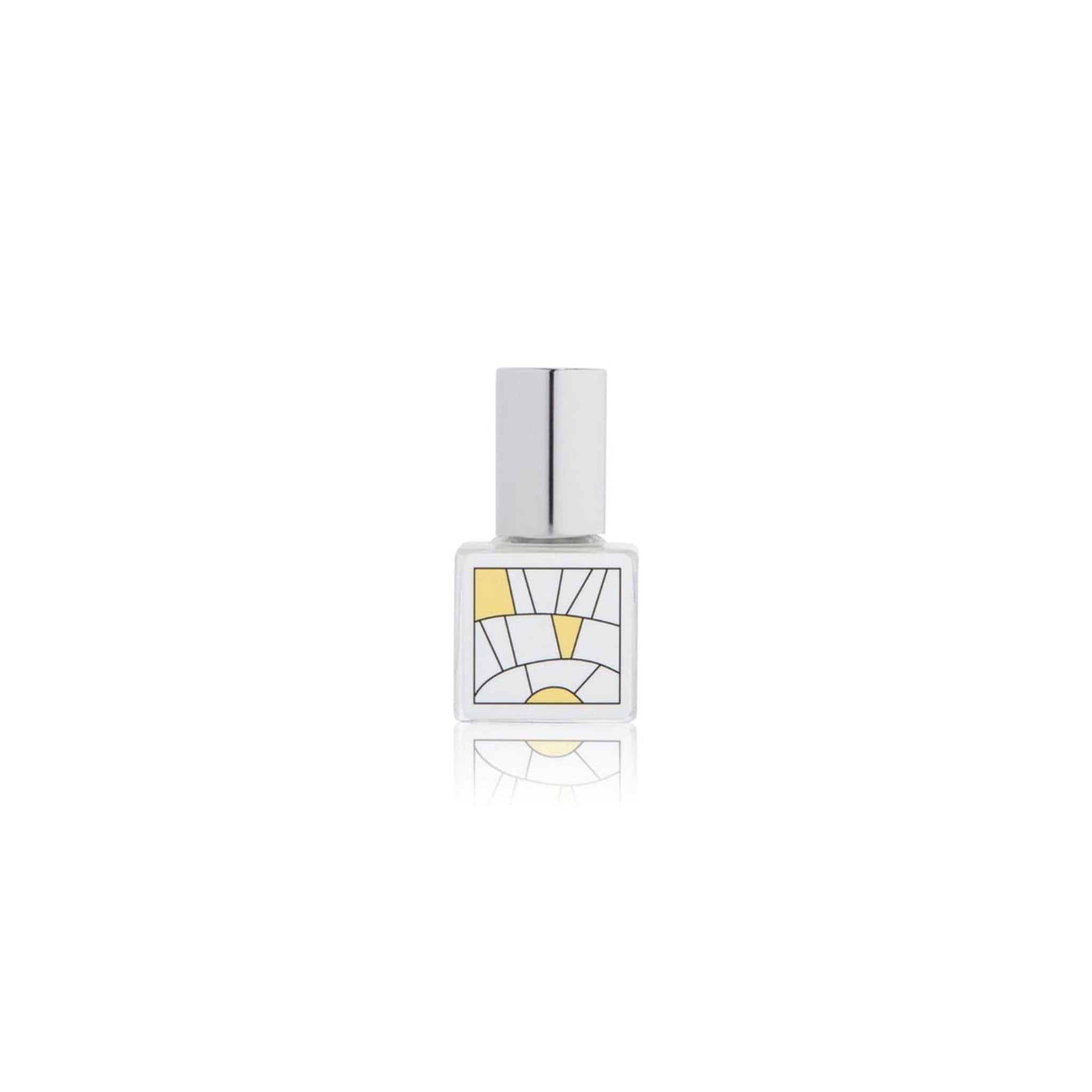 Perfume bottle with geometric design on a white background