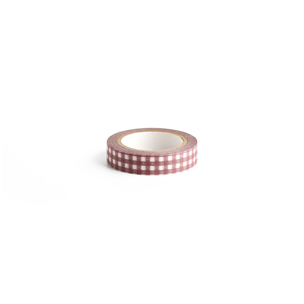 A roll of purple gray and white gingham Classiky washi tape shown on a clean white background.
