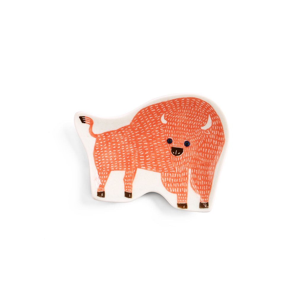 Coral bison-shaped ceramic dish with a textured design.