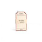 Tag-shaped cream letterpress stationery cards with a red border.