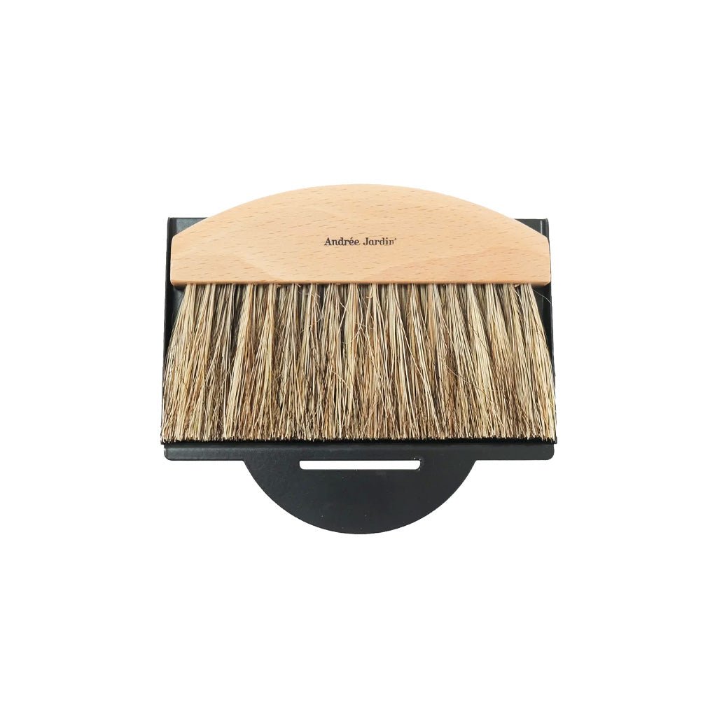 Andree Jardin wooden crumb brush with natural bristles and black metal dustpan on a white background