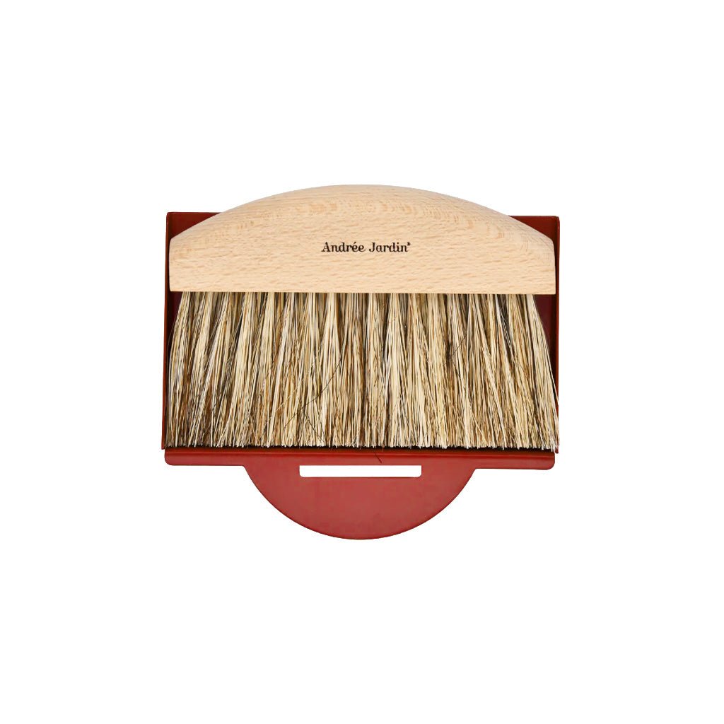 Andree Jardin wooden crumb brush with natural bristles and brick red metal dustpan on a white background