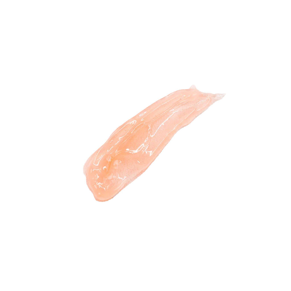 Swatch of rose salve on white background.