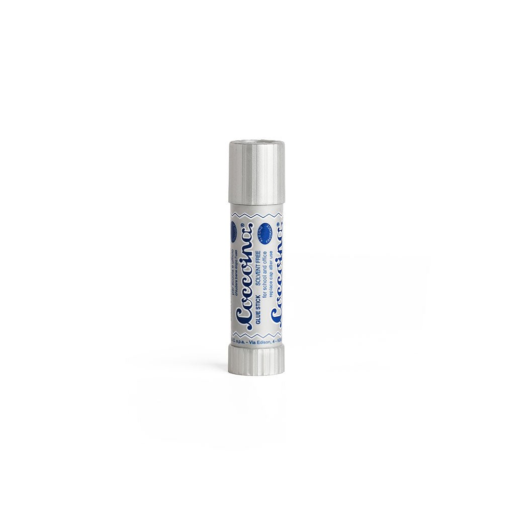 Silver and navy tube of Coccoina Adhesive on a white background