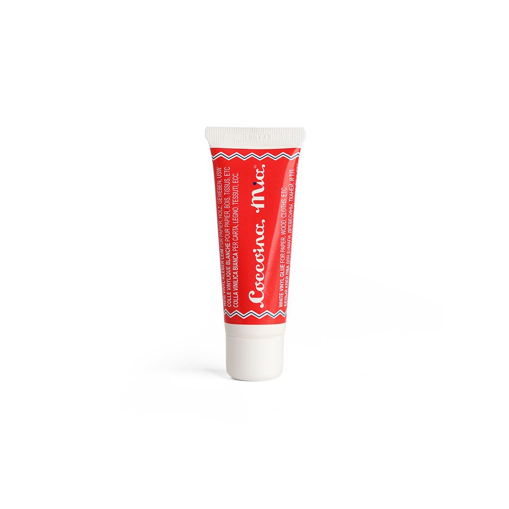 Red tube of Coccoina Mia White Vinyl Glue Adhesive on white background
