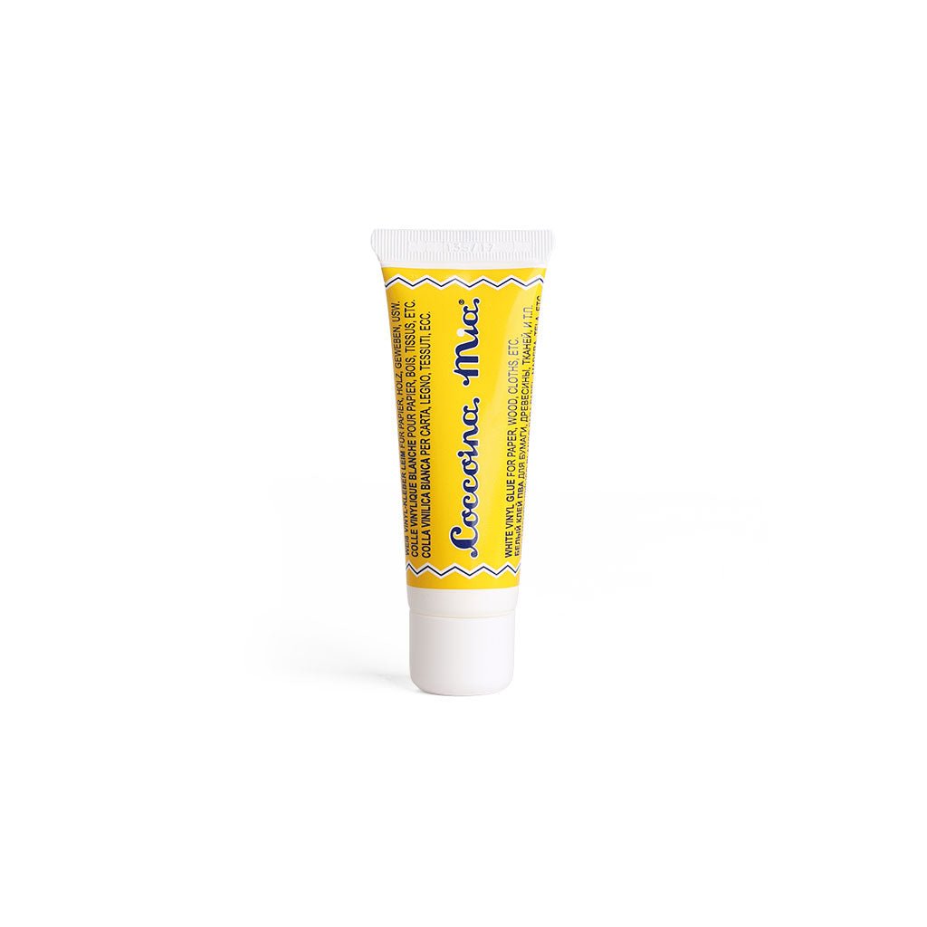 Yellow tube of Coccoina Mia White Vinyl Glue Adhesive on white background
