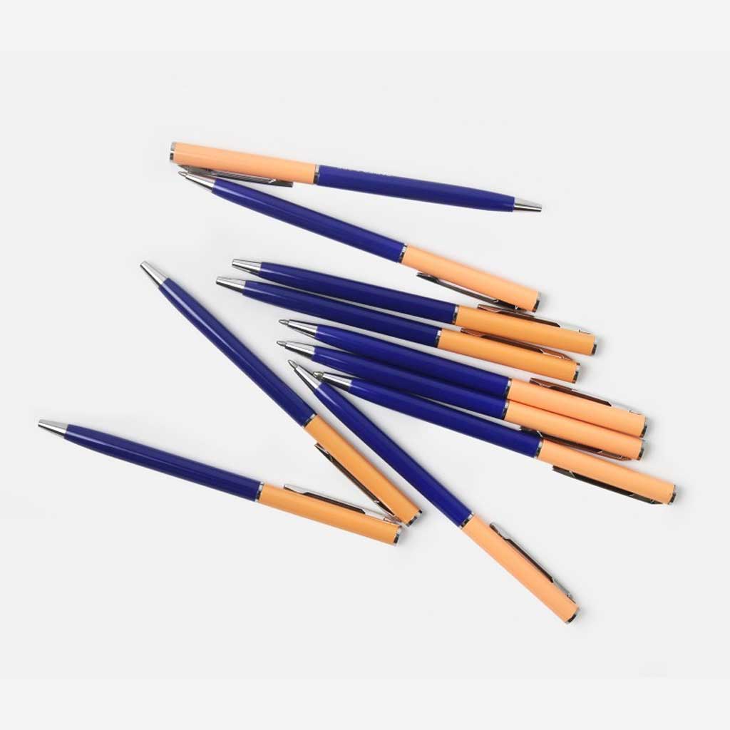 Blue and orange pens scattered on a white background