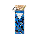 A packaged Cookies & Cream chocolate bar with gold foil wrapping open.