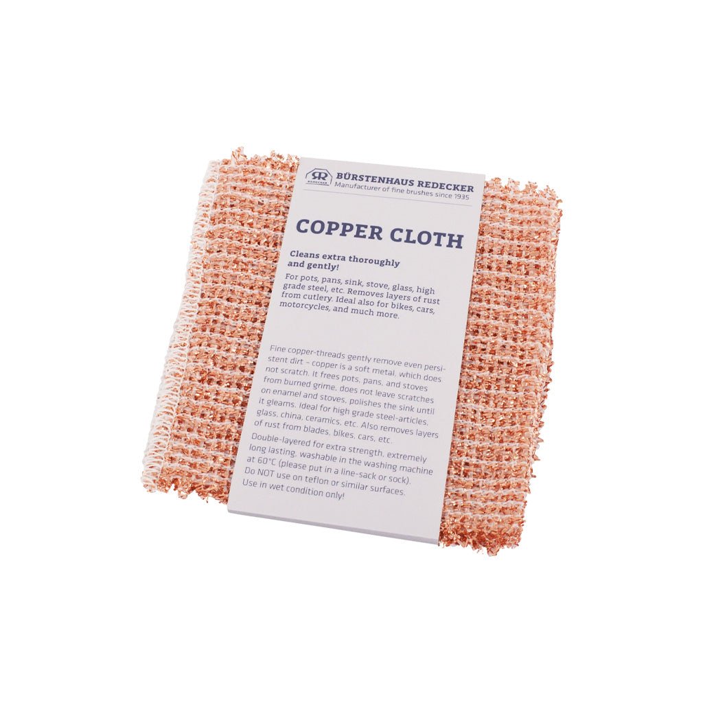 Set of two copper cloths with gray packaging on white background