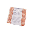Set of two copper cloths with gray packaging on white background