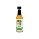 A bottle of Craic Sauce 40 Shades of Green Chili hot sauce on a plain white background.
