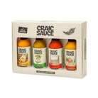 Craic Sauce Hot Sauce 4-piece gift set in a cream-colored cardboard box displaying four different hot sauce bottles.