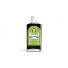 Bottle of D.R. Harris & Co. Alpine bath oil on a white background
