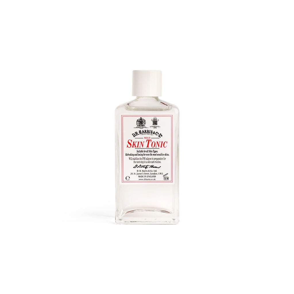 Bottle of D.R. Harris skin tonic with a label on a white background