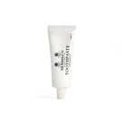 D.r. Harris spearmint toothpaste tube on a white background