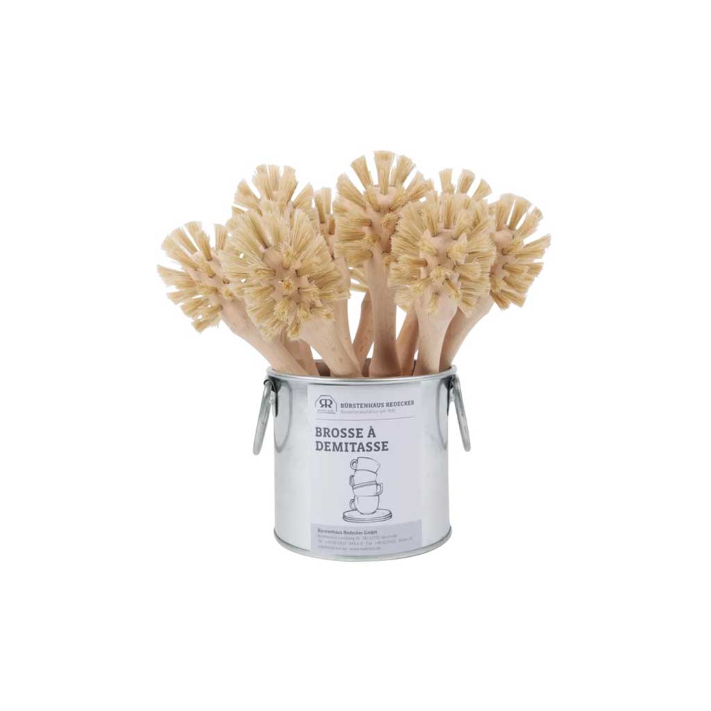 Set of demitasse bottle brushes in metal tin with German label on white background