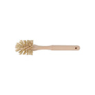 Small wooden demitasse bottle brush with horsehair fibers on white background