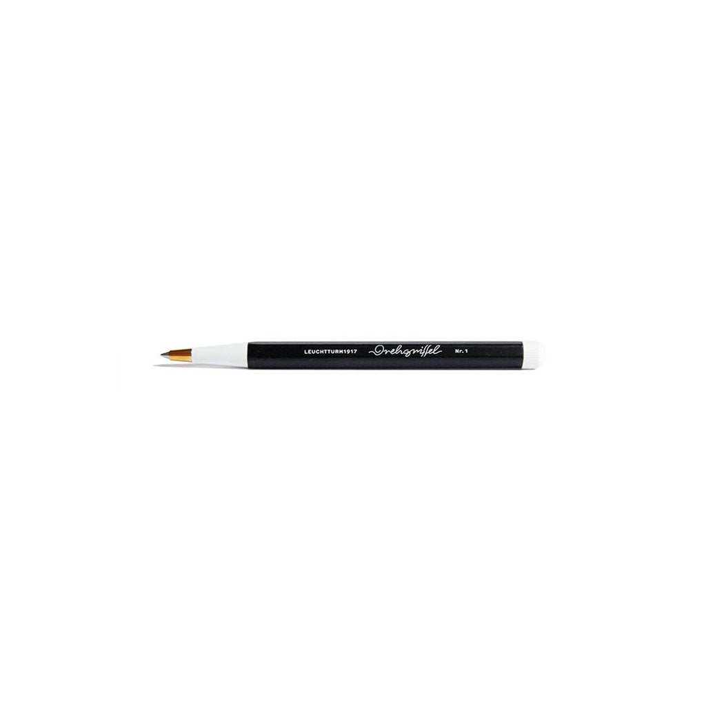 Black pen with white cap on a white background