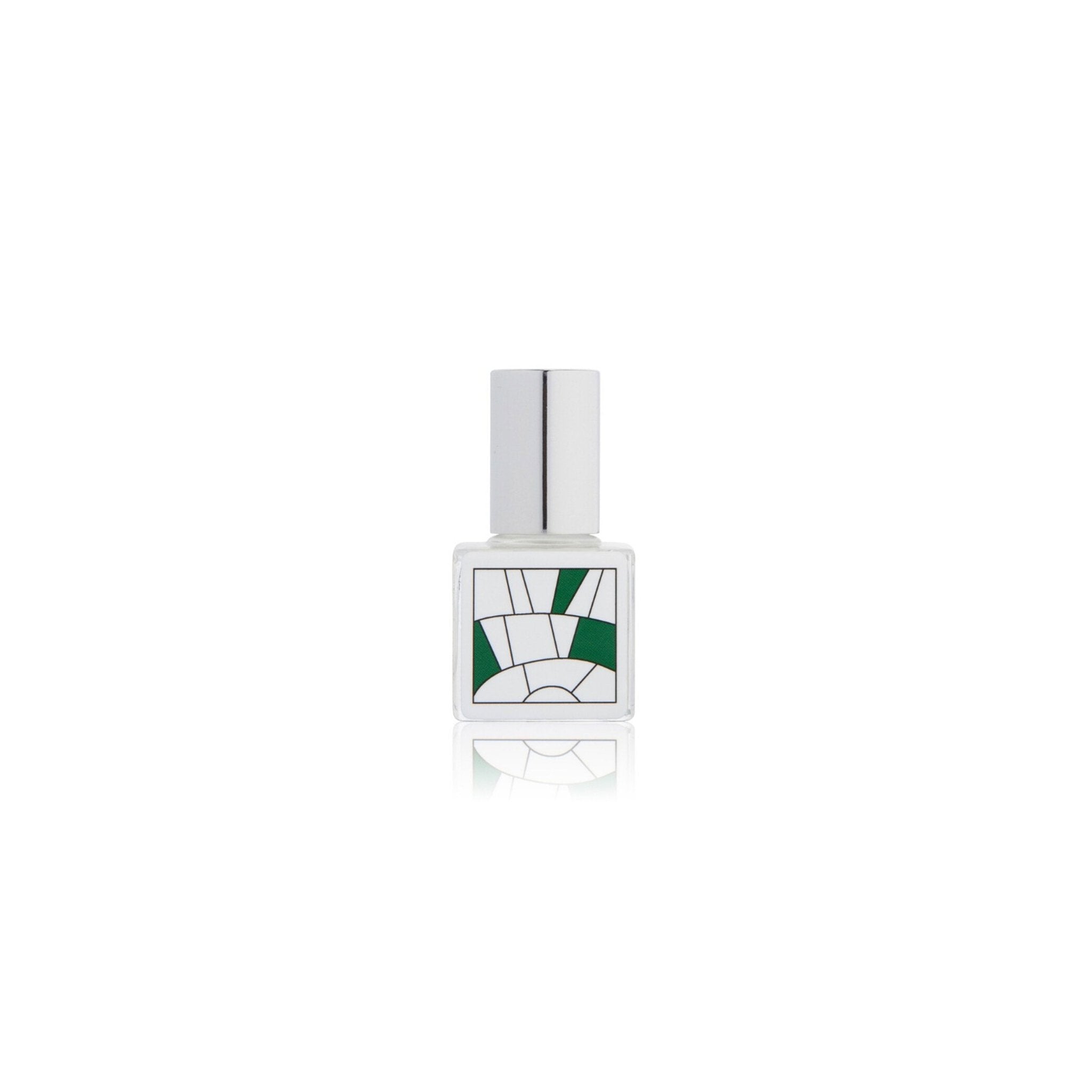 Bottle of perfume oil with green geometric pattern