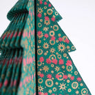 Screen-printed details on Christmas tree paper decoration.