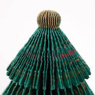 Close-up of top of paper tree decoration.