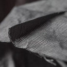 Close-up of textured fabric with a focus on texture and pattern.