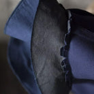 Close-up of a blue fabric with textured edge