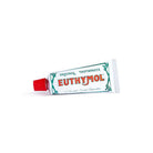 Euthymol toothpaste tube on a white background