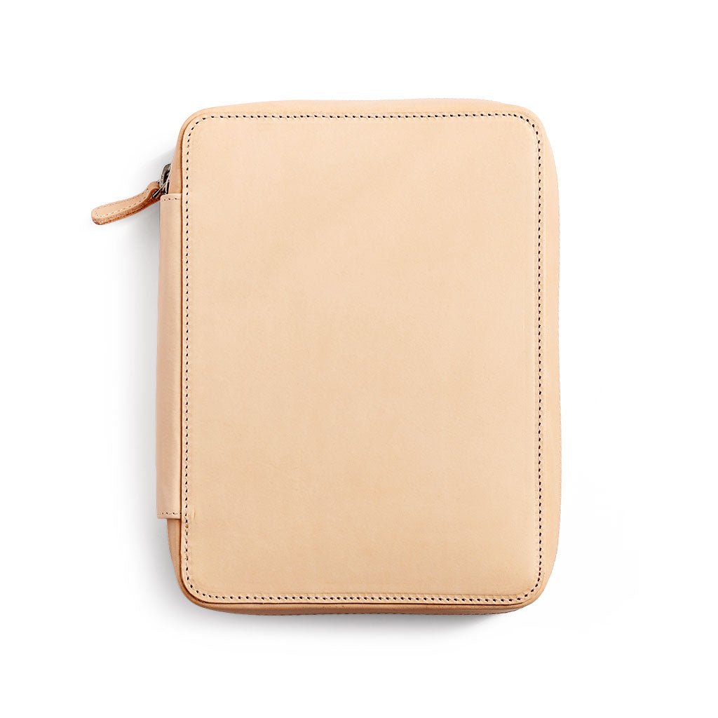 Natural undyed leather folio zippered pouch on white background